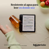 El eReader Kobo Libra Color Negro de 32 GB de Kobo, con pantalla a color, muestra texto en español sobre su resistencia al agua. Una taza naranja derrama agua cerca del dispositivo cuando una mano se extiende; el logotipo de Kobo es visible.