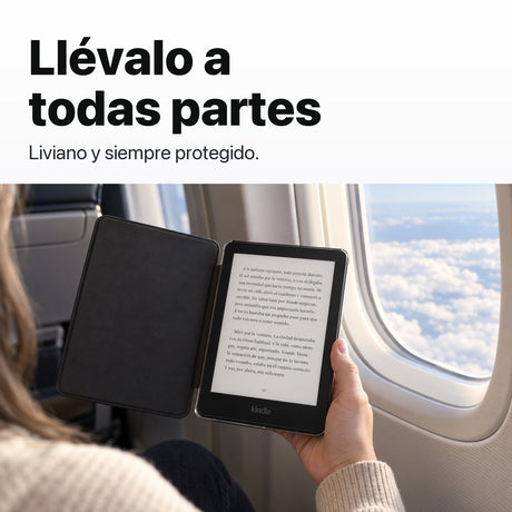 Kindle Paperwhite con funda acrílica negra en un viaje en avión