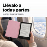 Kindle Paperwhite con funda acrílica rosa en un viaje en avión