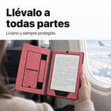 Kindle Paperwhite con funda libro rosa en un viaje en avión