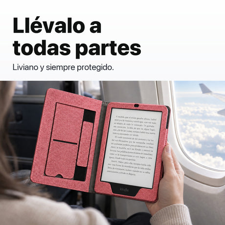 Kindle Paperwhite con funda libro rosa en un viaje en avión
