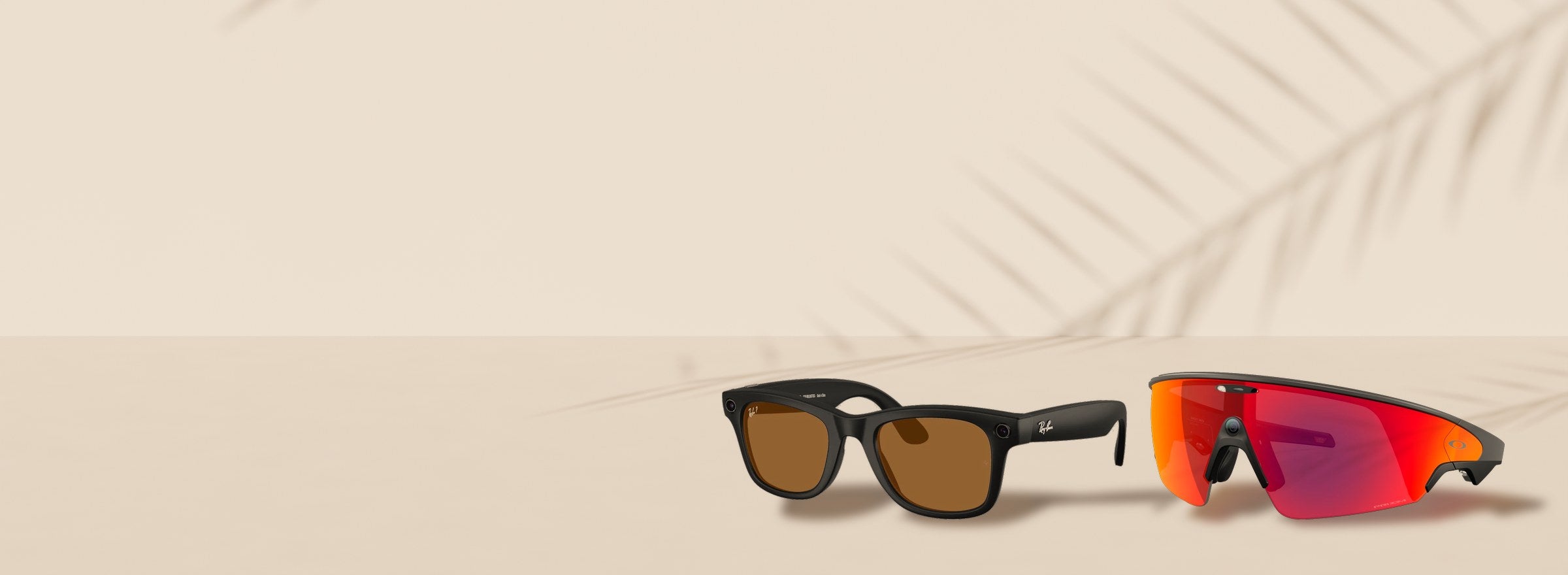 Lentes Ray-Ban Meta y Oakley Meta sobre una mesa al sol